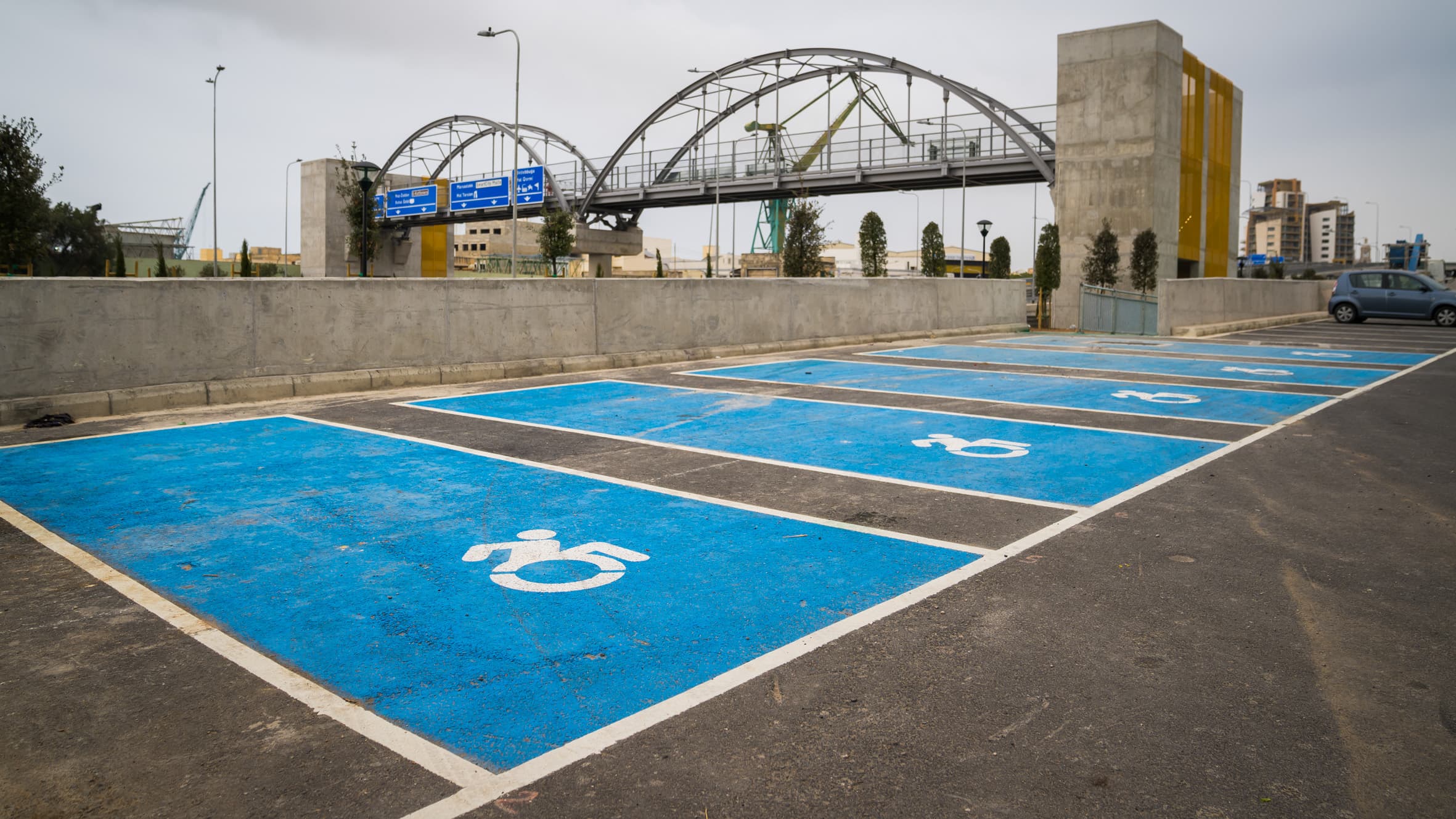 Blue-marked disabled parking bay — reserved for permit holders
